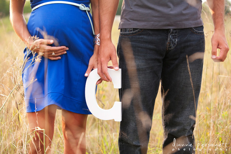 Charlotte maternity photos in a field