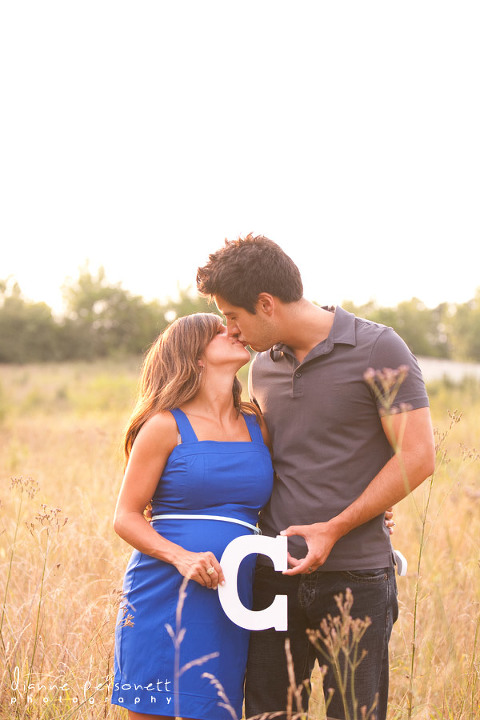 Charlotte maternity photos in a field