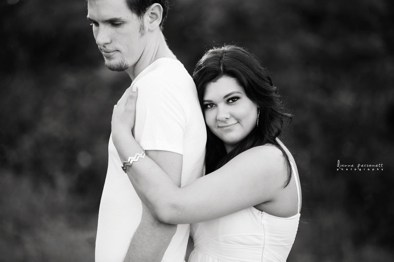 charlotte engagement photos in a flower field